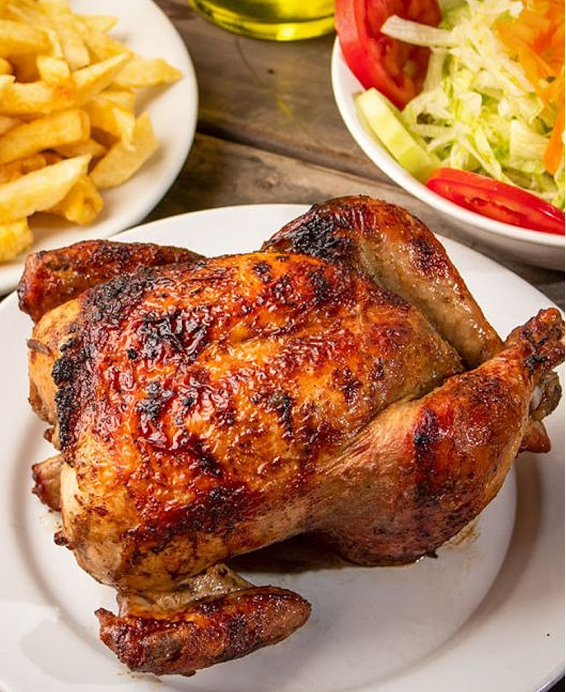 Recette traditionnelle du Pollo a la Brasa péruvien : goût fumé, marinade authentique